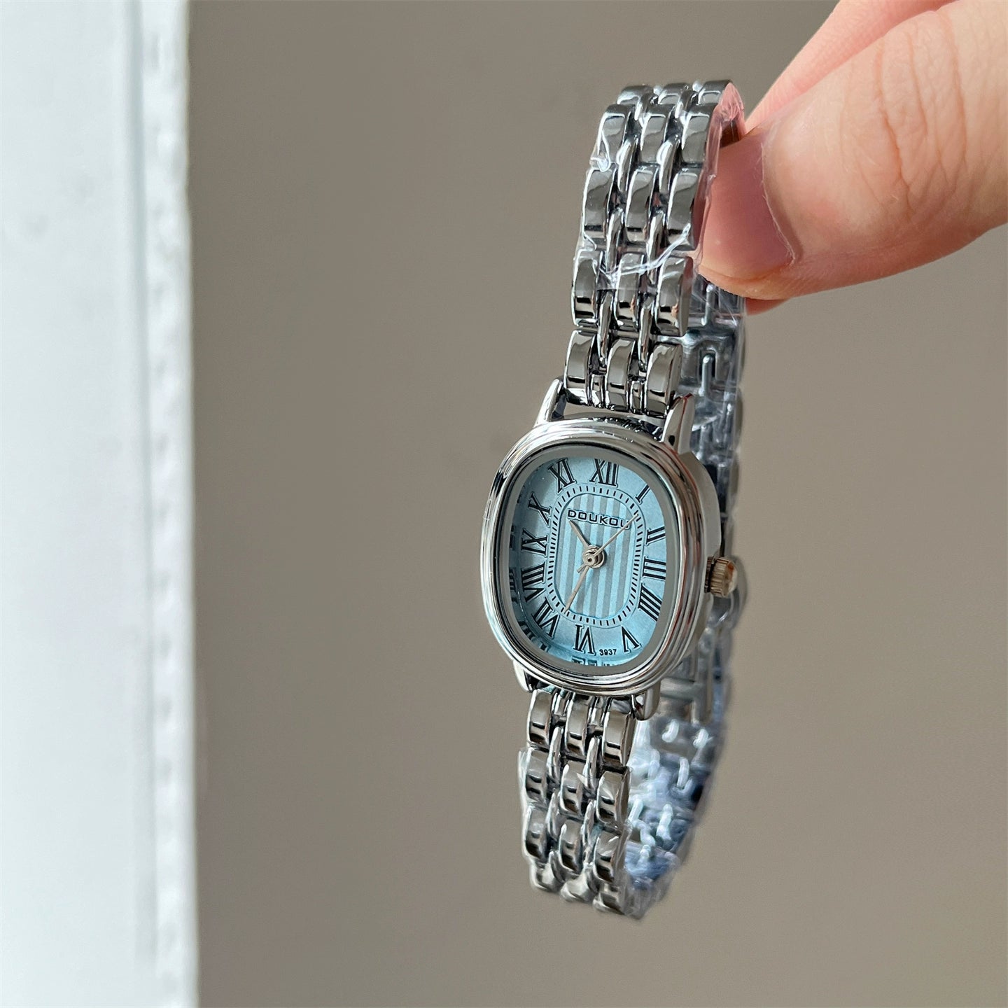 Kaydance Dainty Daisy Watch - Silver Band Blue Oval Roman Dial [B1AGO676]