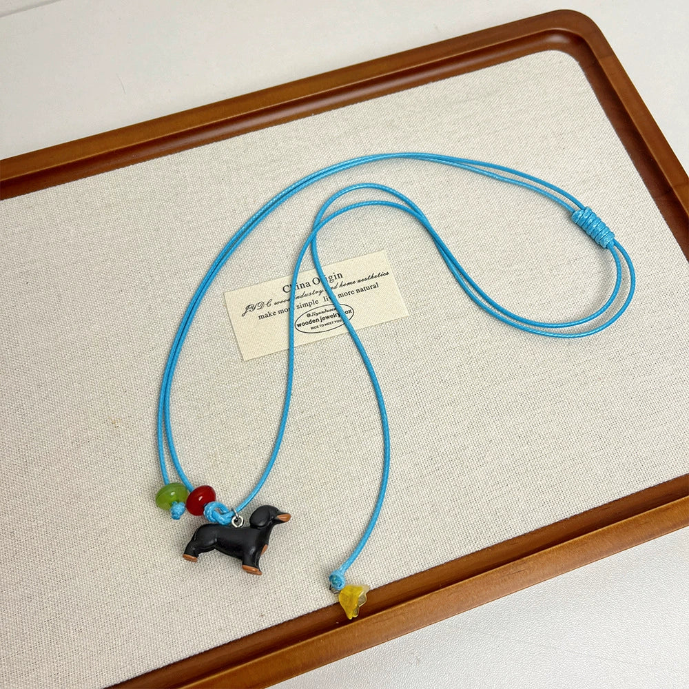 Keilyn Leather Puppy Necklace - Blue Leather Puppy Necklace [WVNM020T]