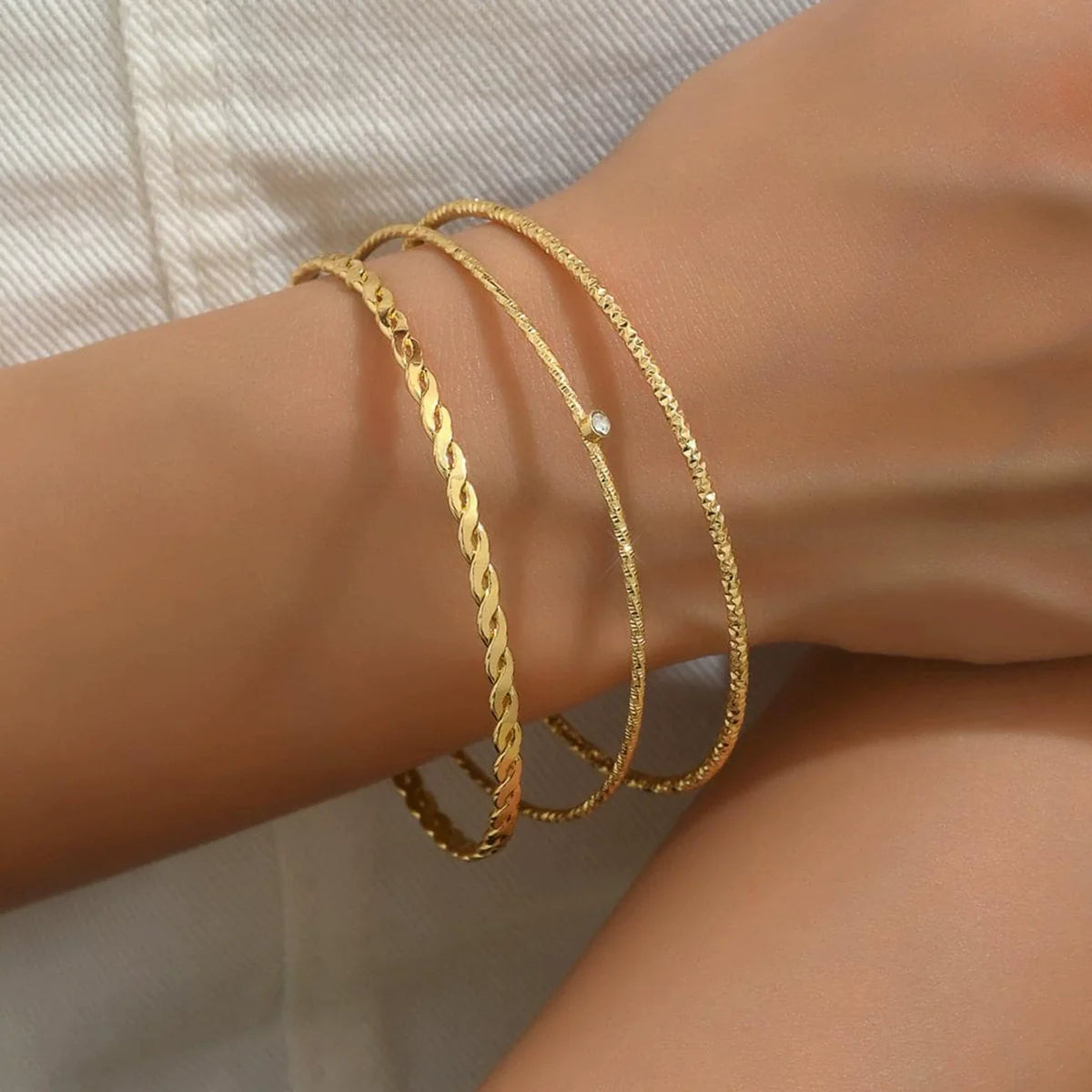 Melania Twisted Rhinestone Bracelet Set - Gold Three-Piece Set