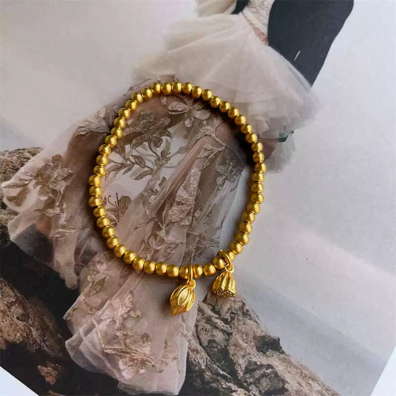 Annaleigha Enamel Butterfly Bracelet - Elastic Cord Gold Bead Lotus Pendant Style [D16PGEYA]