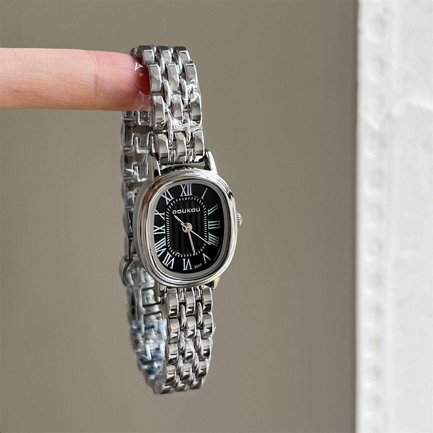Kaydance Dainty Daisy Watch - Silver Band Black Oval Roman Dial [YLRFAPJ2]