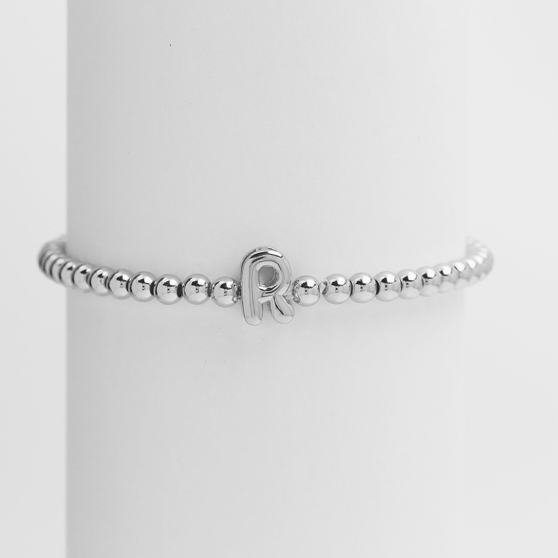 Jorie Polished Letter Bracelet - Silver R [12VYE0QP]