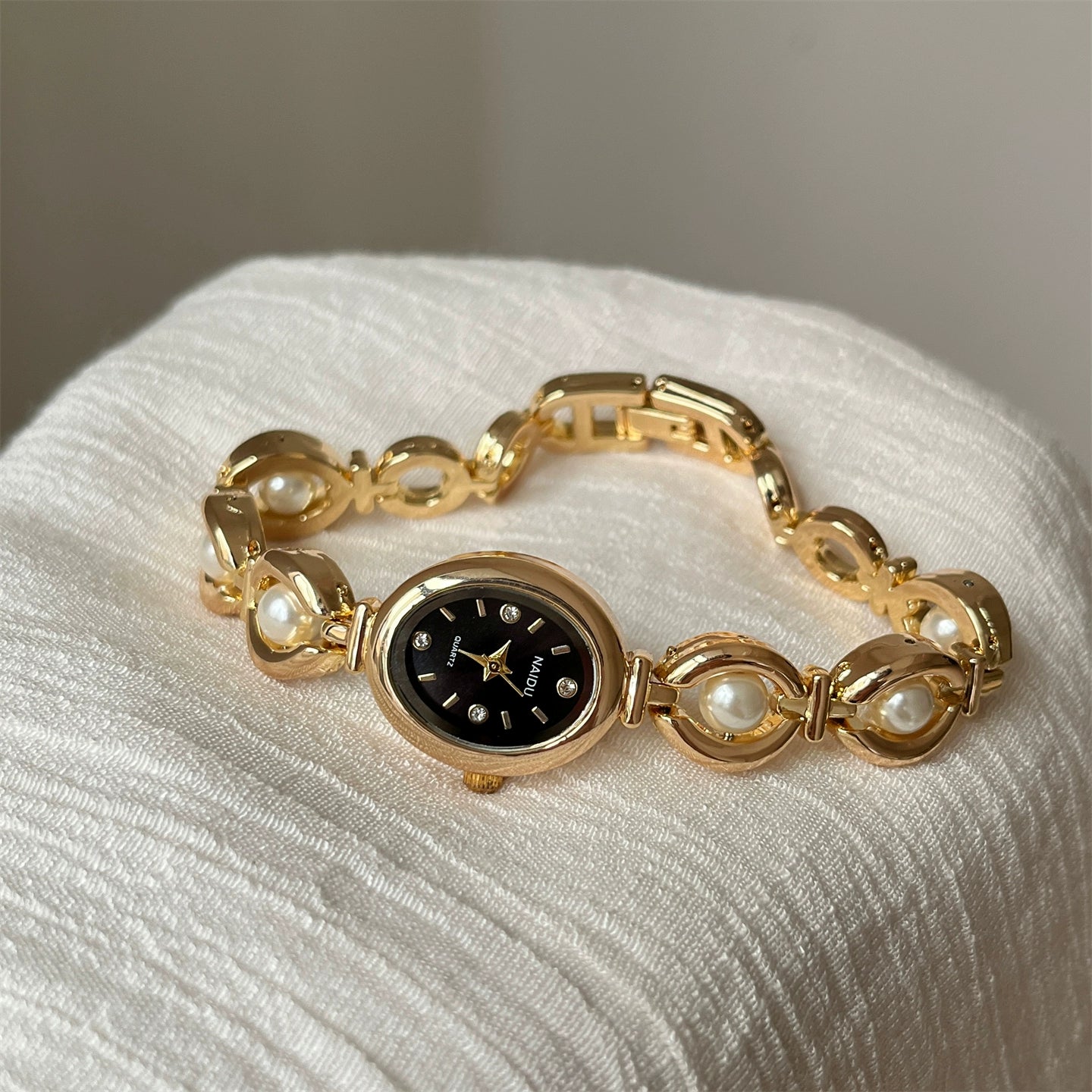 Camelia Oval Pearl Bracelet Watch - Gold Band Black Face [SO4X8IRA]