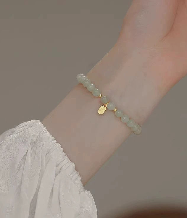 Kathy Delicate Charm Bracelet - Small Green Bead Lucky Charm Bracelet