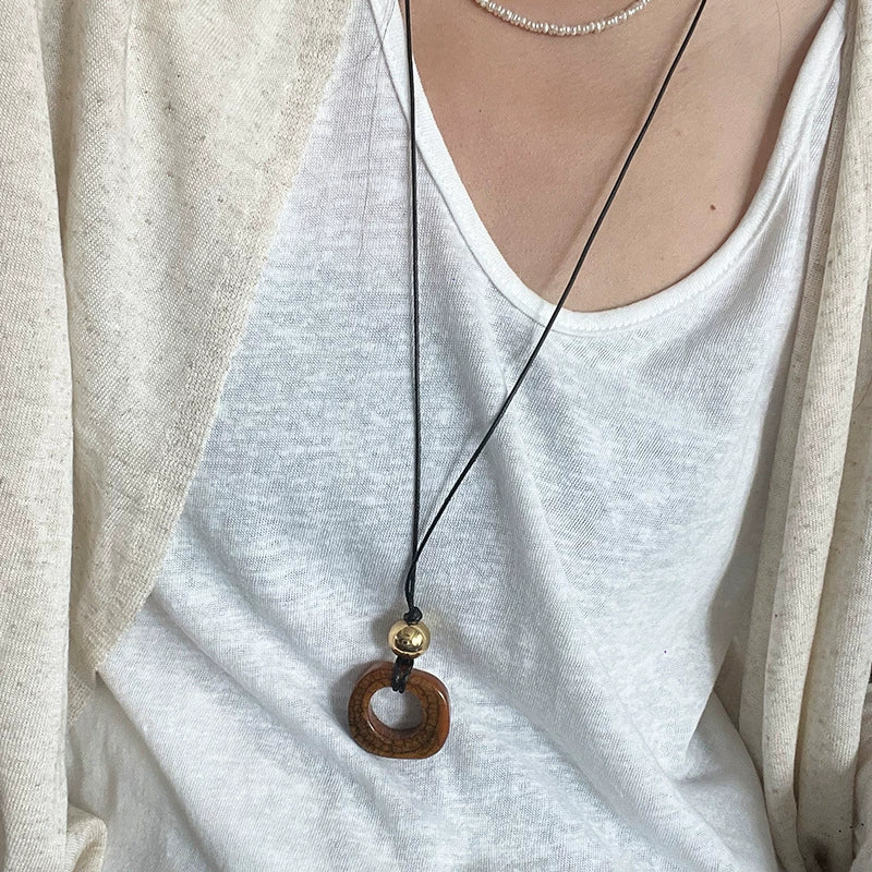 Denisse Geometric Pendant Necklace - Gold Bead Coffee Pendant Necklace [NYPL27KG]