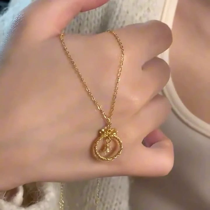 Krisha Gold Bow Bell Necklace - Bow Bell Necklace