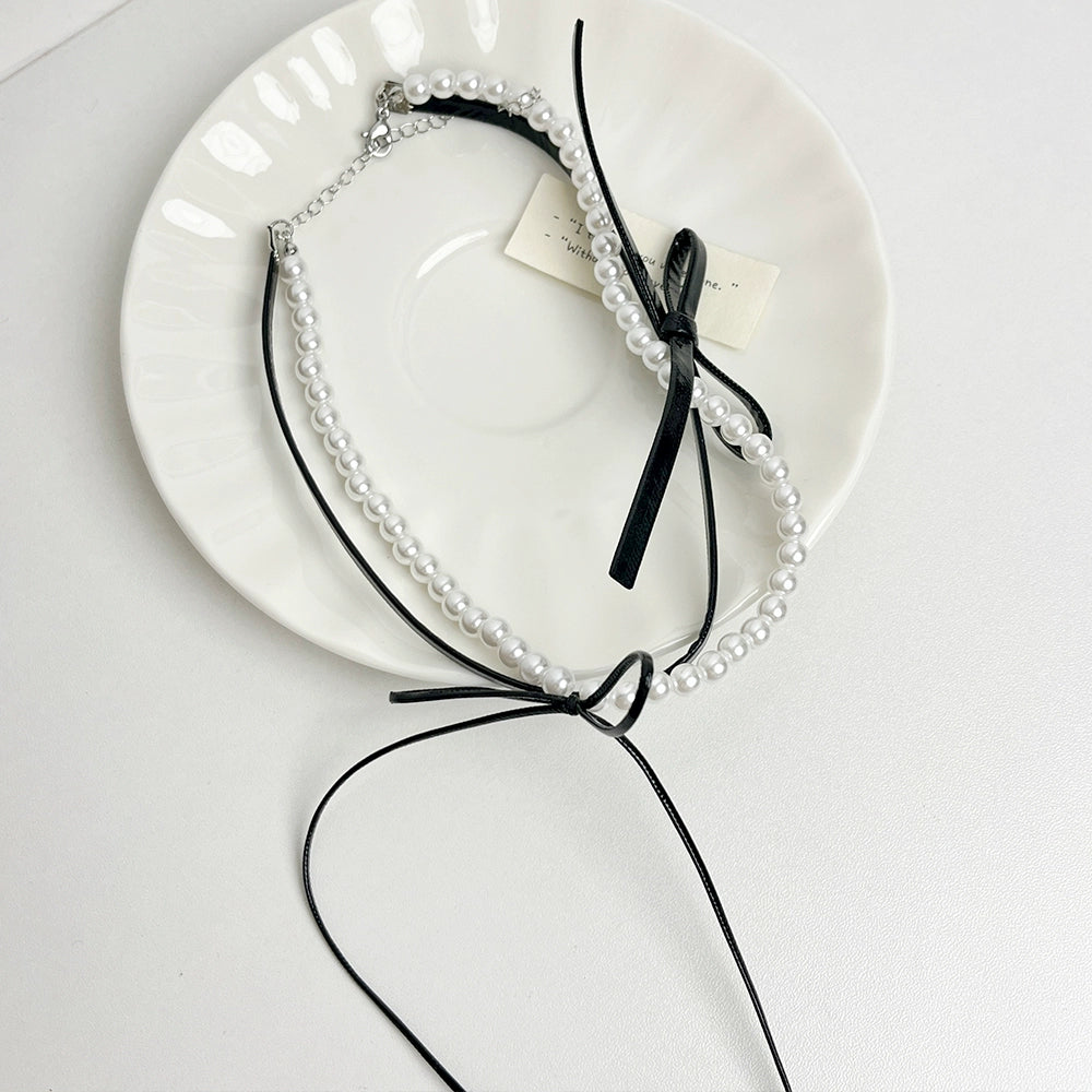 Marah Pearl Bow Necklace - Black Necklace [XVONP1BK]