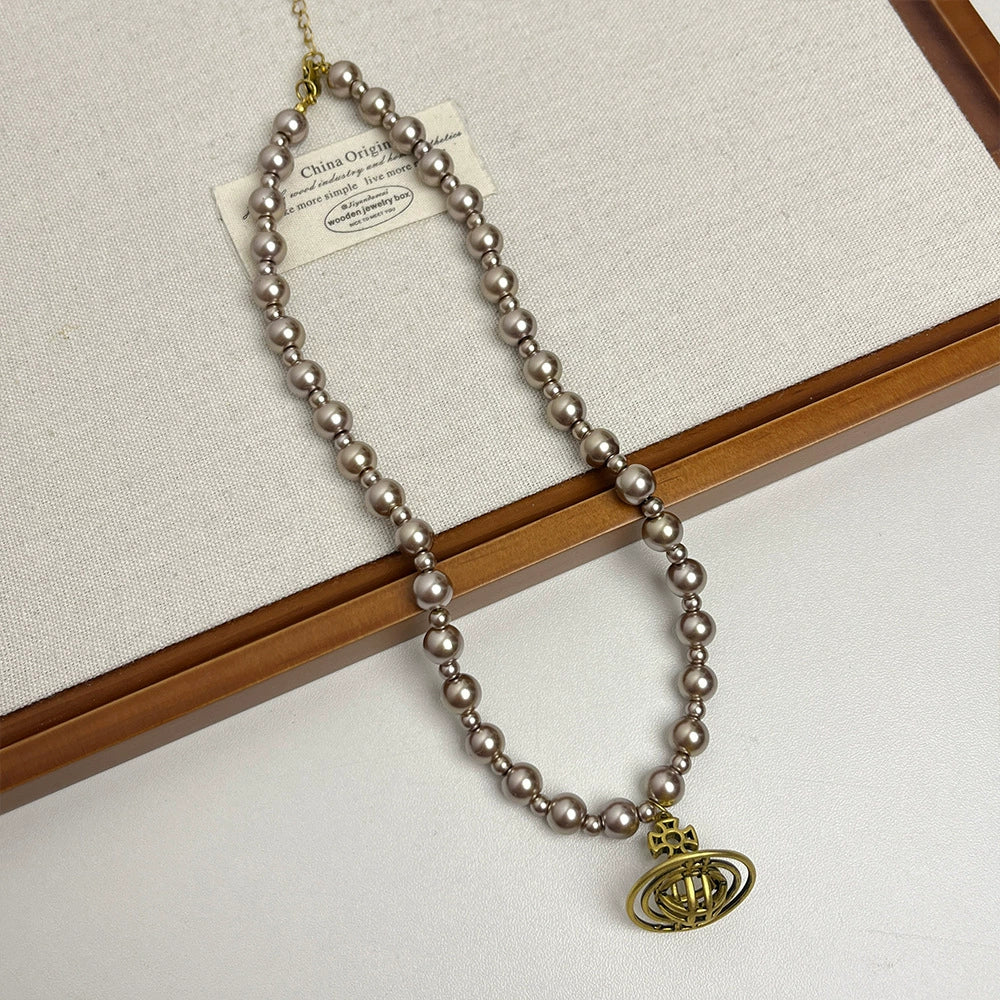 Ashly Celestial Pearl Necklace - Saturn Pendant Champagne Pearl Necklace [4Q5S1O8V]