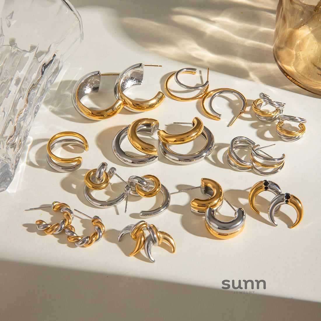 Ahlam C-Shaped Statement Earrings [PNM4D8X7]