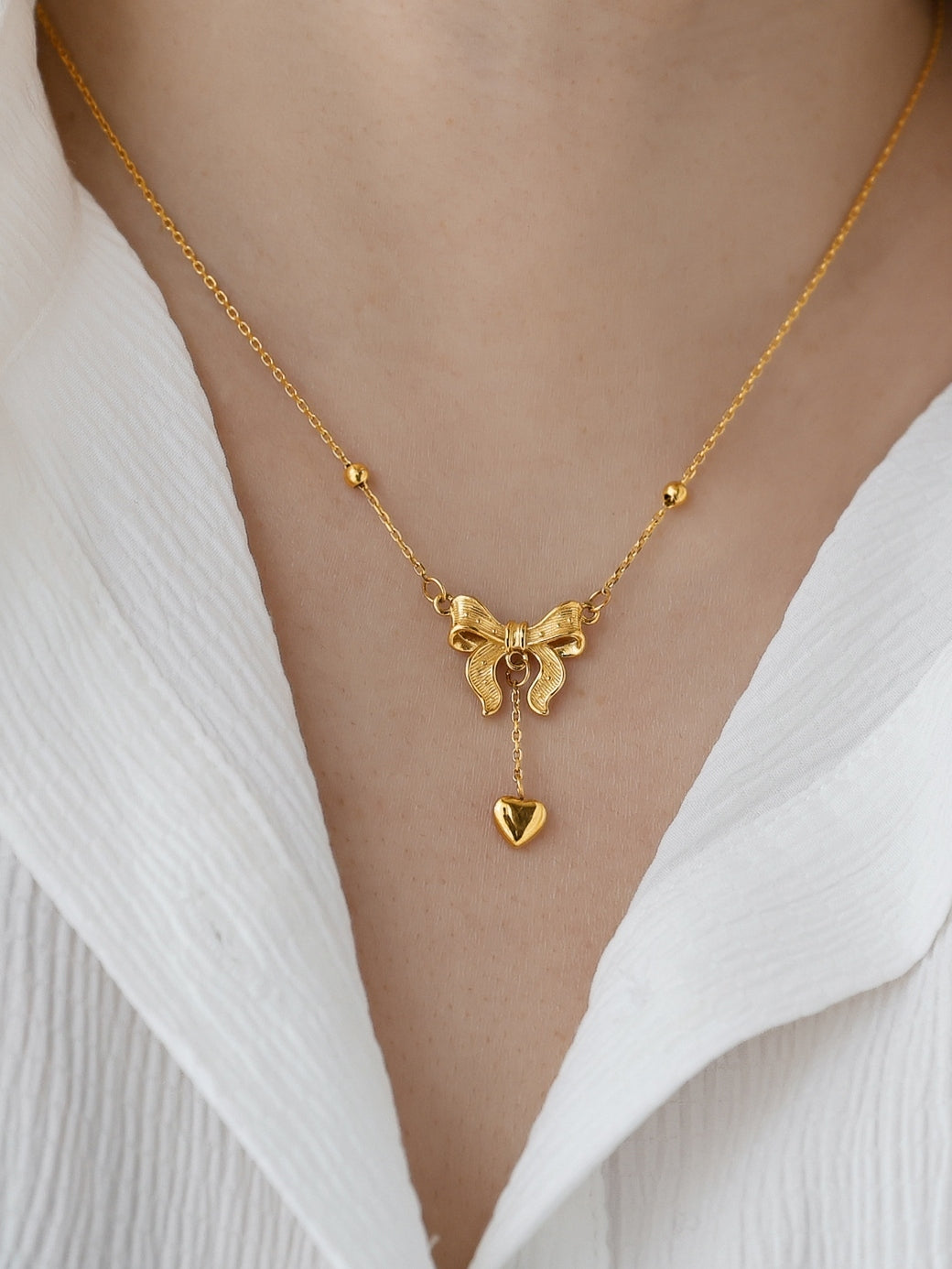 Ailani Gilded Butterfly Bow Necklace [5DUORYTF]