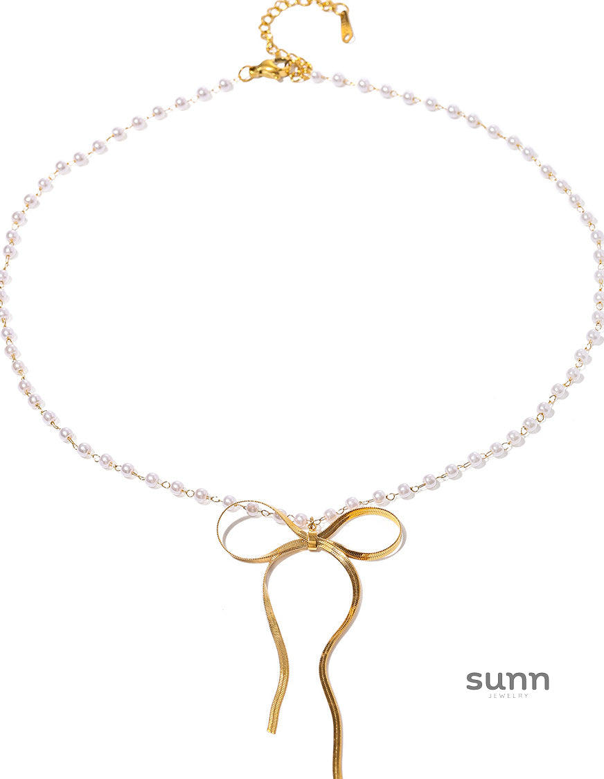 Alannah Crystal Bow Necklace [ZMDI44BP]