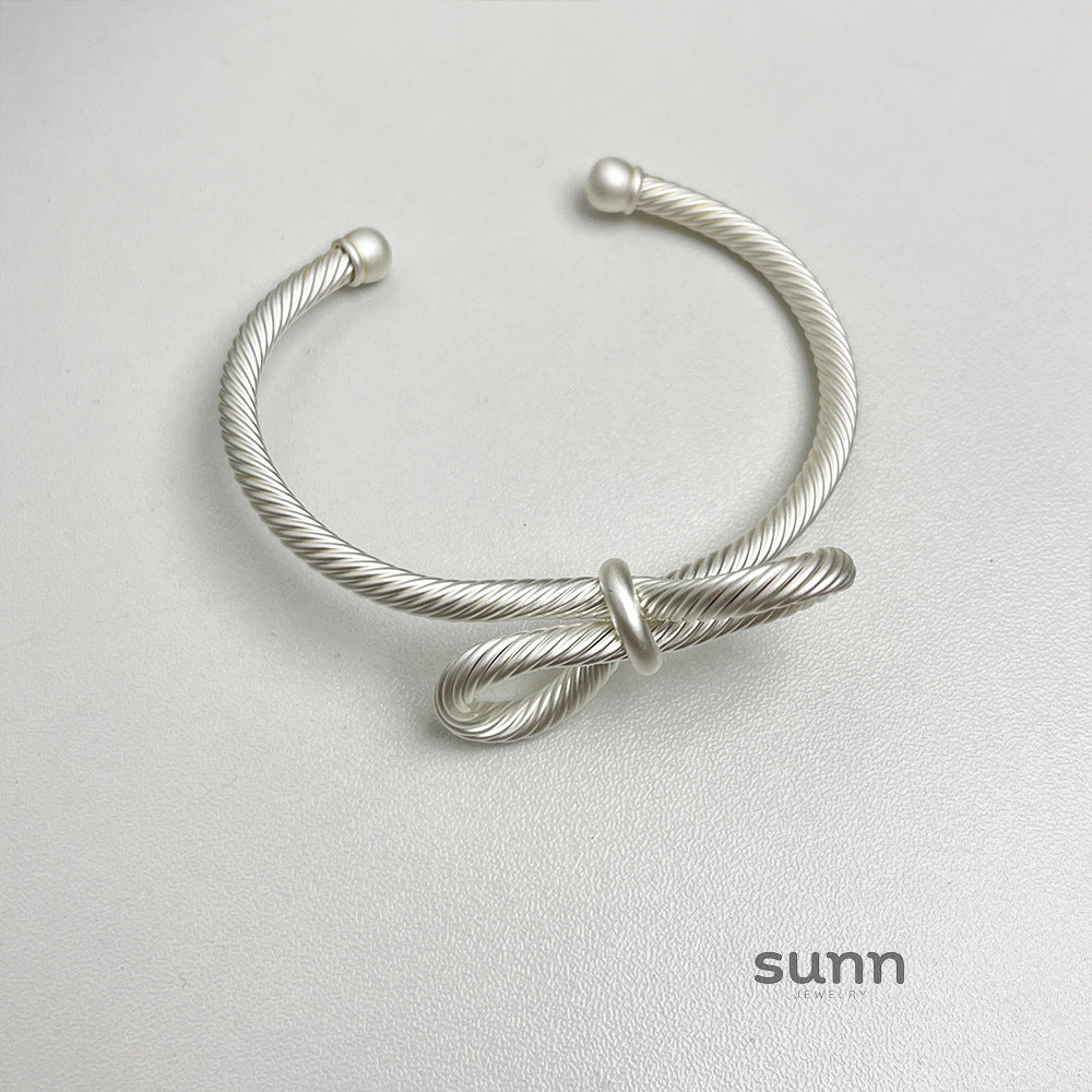 Amauri Frosted Braided Bow Bracelet [HM1G9GGC]