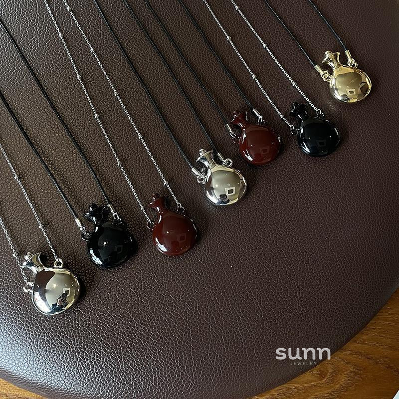 Andra Perfume Bottle Necklace [TB7RR7LV]