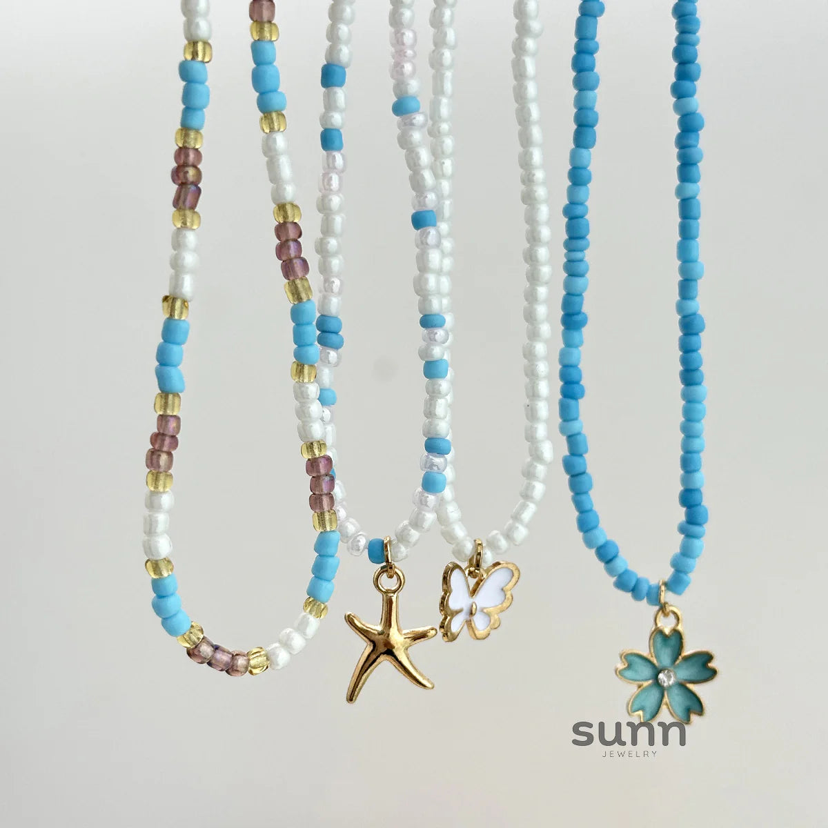 Anniston Layered Ocean Charm Necklace Set