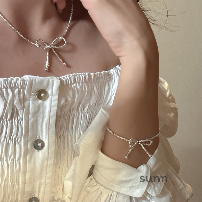 Ashtyn Glitter Bow Necklace [GMNKRGKO]