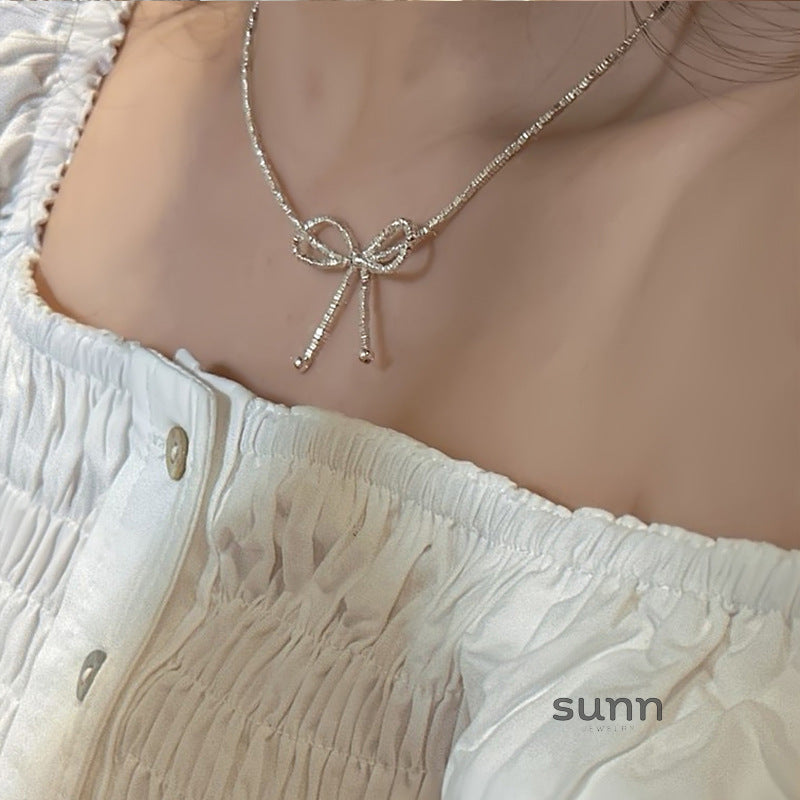 Ashtyn Glitter Bow Necklace [PUL4K0X4]