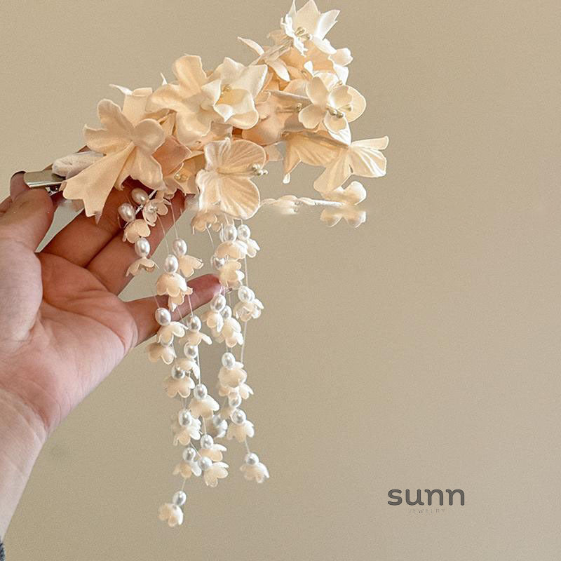 Basma Lily Tassel Hair Clip [0OP7MDPV]