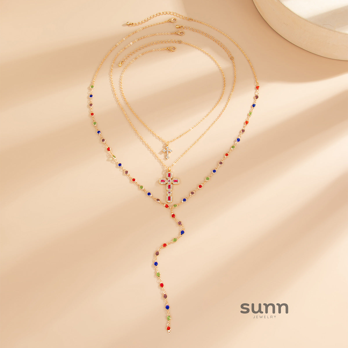 Brynlee Layered Tassel Cross Necklace [T2TPCGUA]