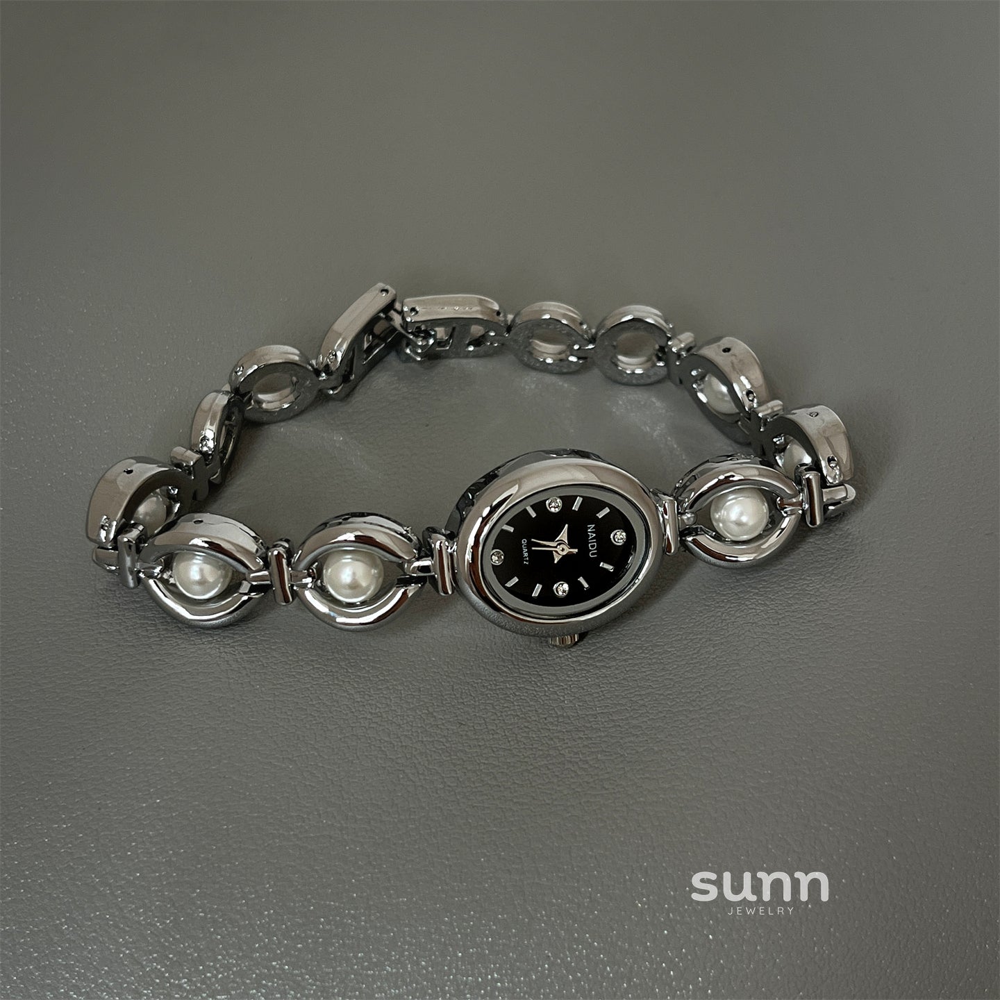 Camelia Oval Pearl Bracelet Watch [S3KCAR1I]