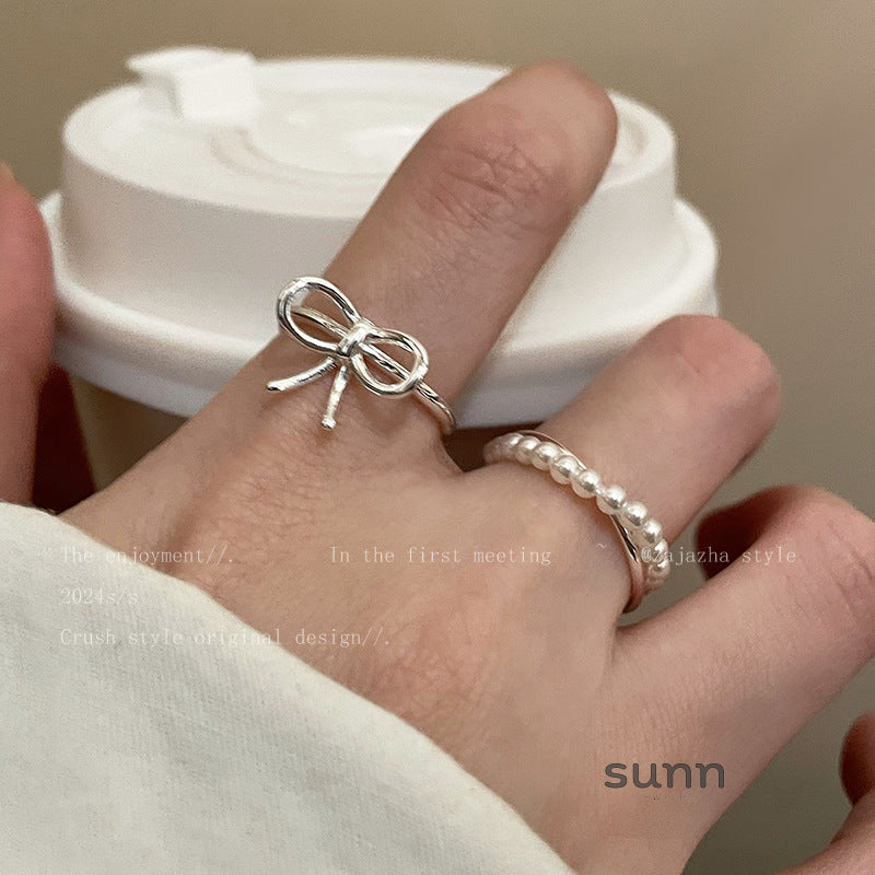 Cana Delicate Bow Pearl Ring [NVJHSMNS]