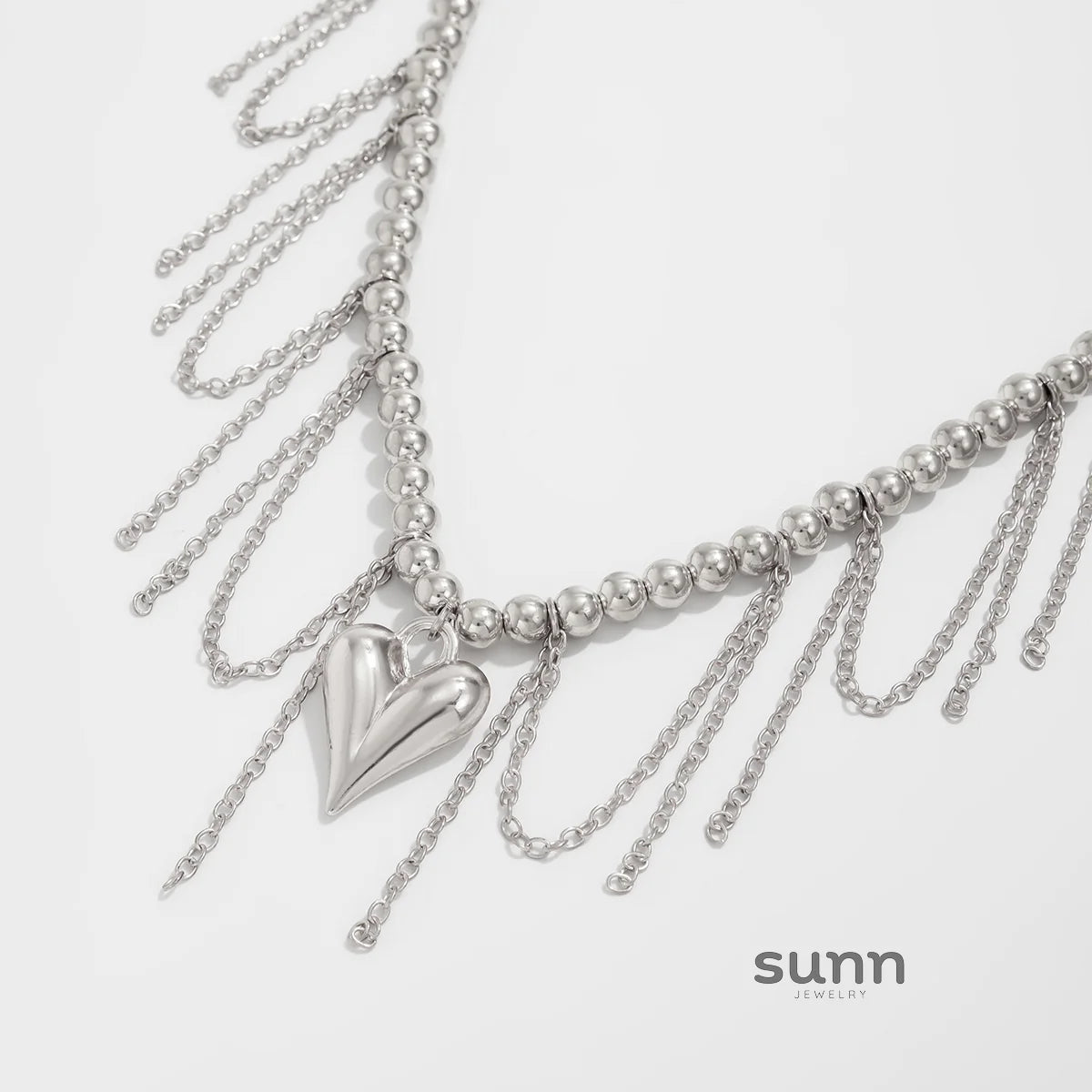 Carleigh Heart Charm Tassel Necklace