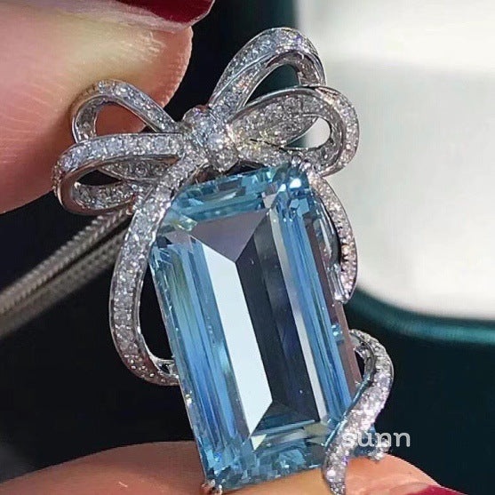 Cierra Aquamarine Bow Necklace [YUNIGT80]