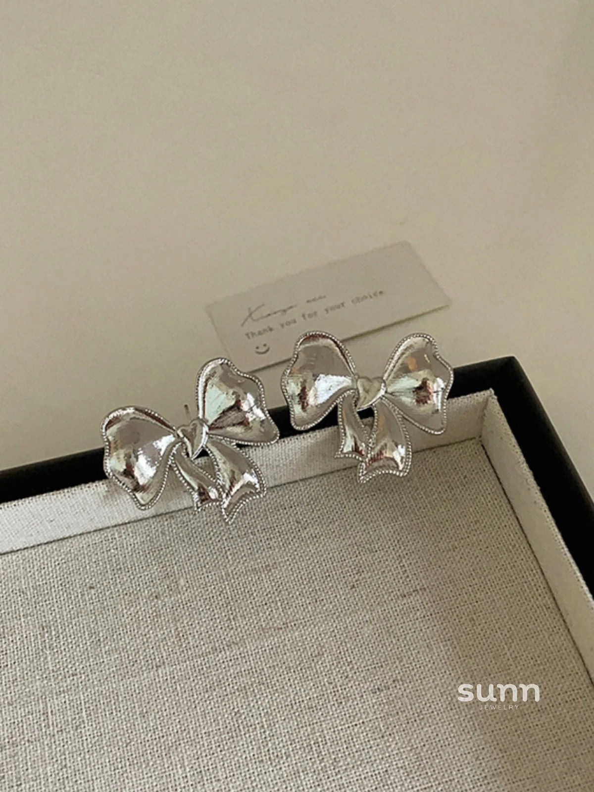 Coralie Metallic Bow Stud Earrings
