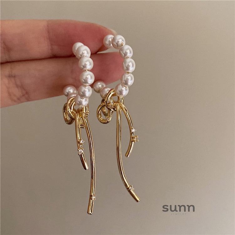 Daila Bow Pearl Earrings [1JL35GHV]