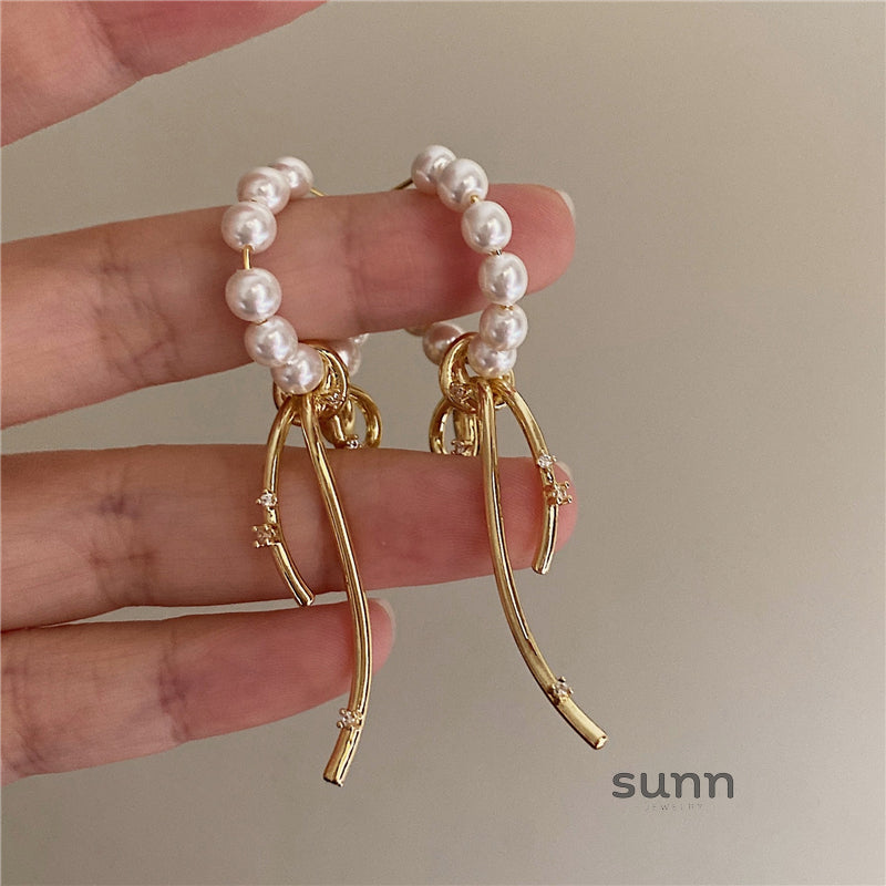 Daila Bow Pearl Earrings [HED7C9JI]