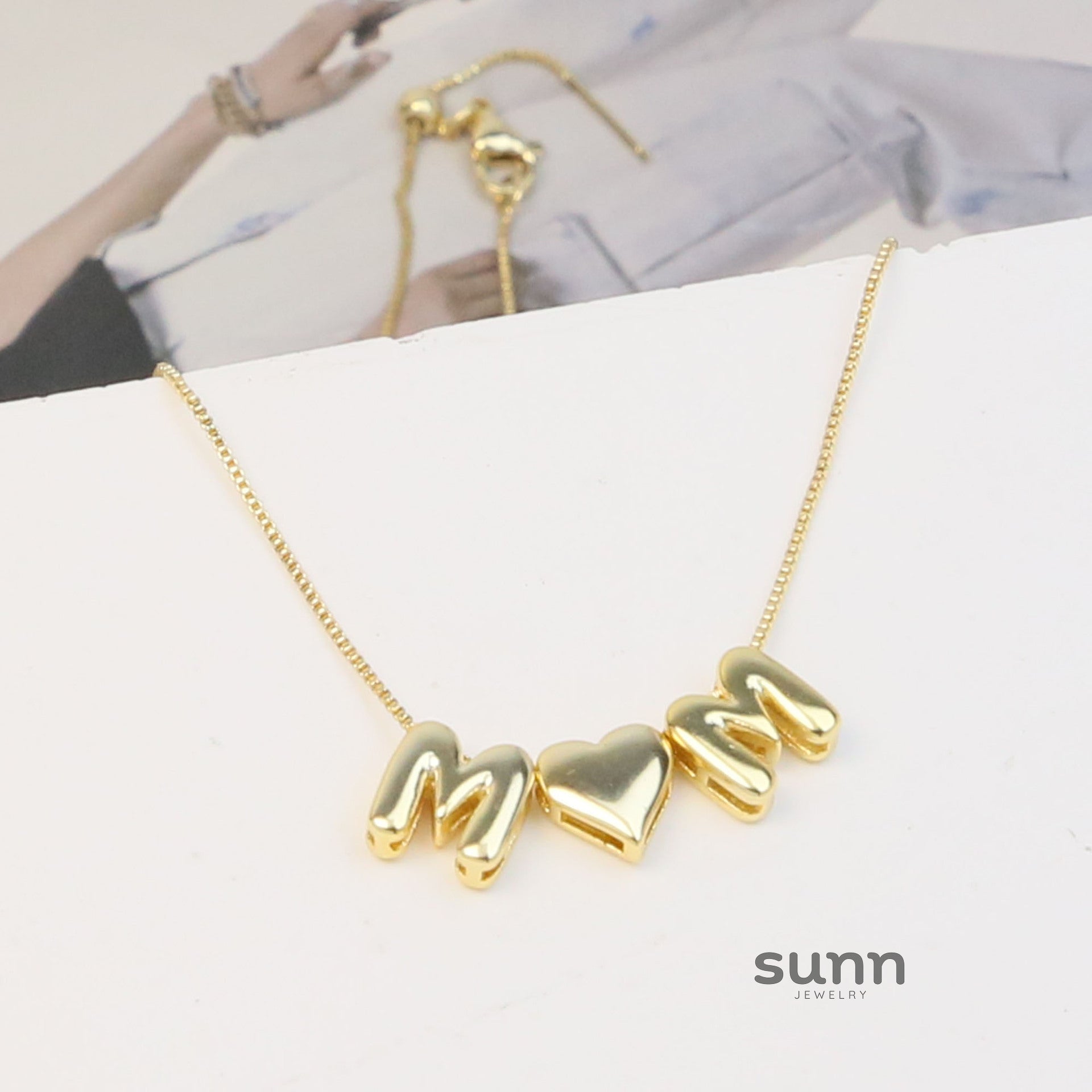 Deliah Brass Bubble Charm Necklace [00CVQCZC]