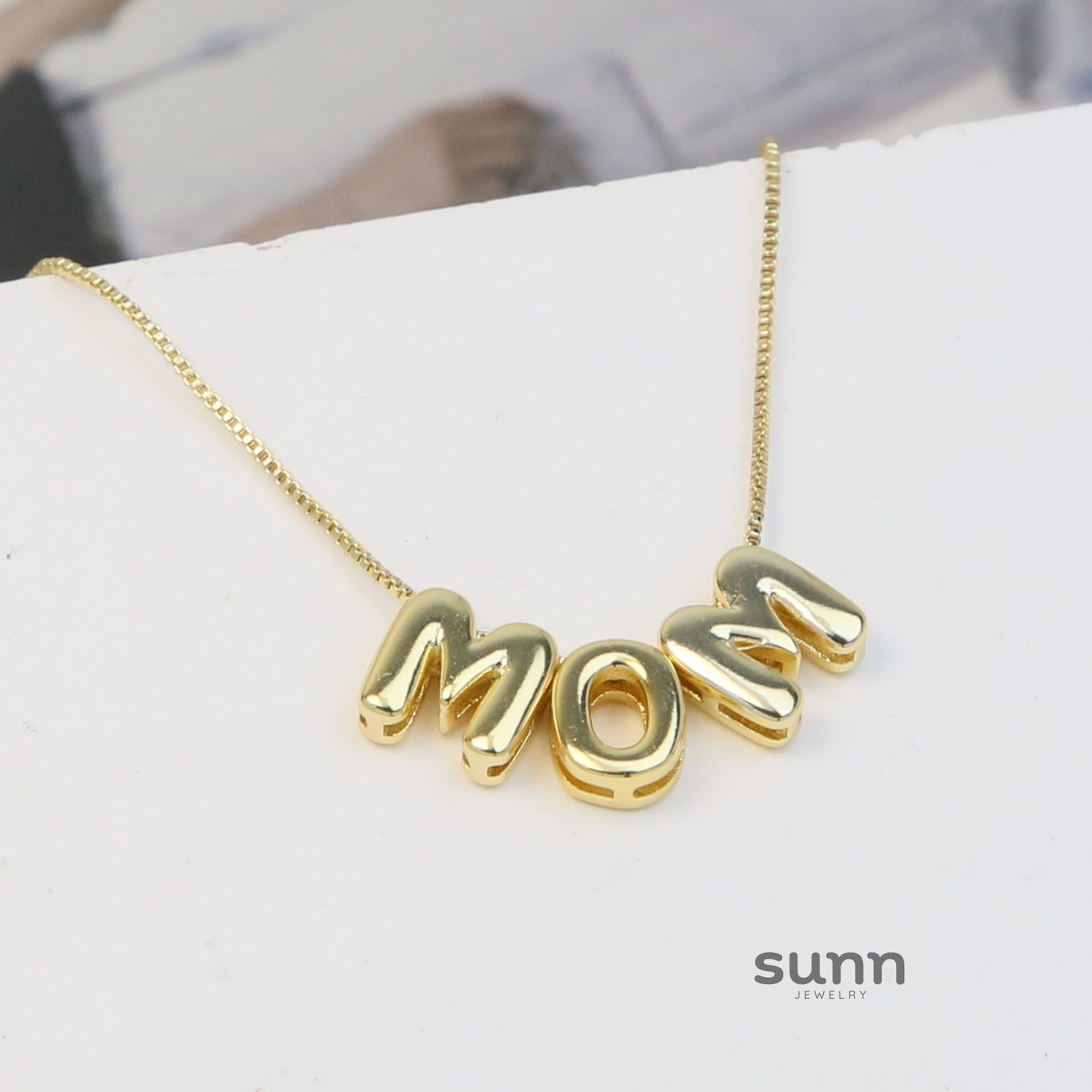 Deliah Brass Bubble Charm Necklace [8NJ9H5J2]