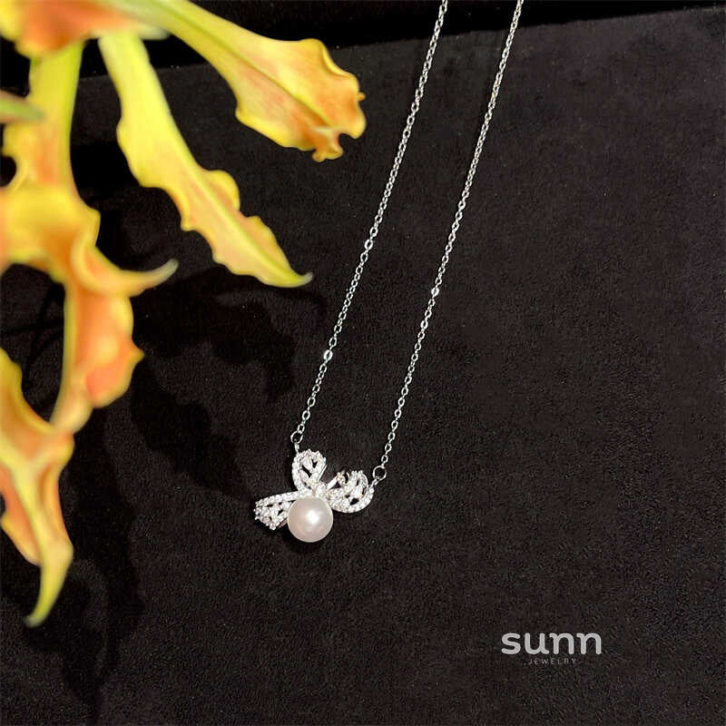 Eliana Delicate Pearl Bow Jewelry [FZL05115]