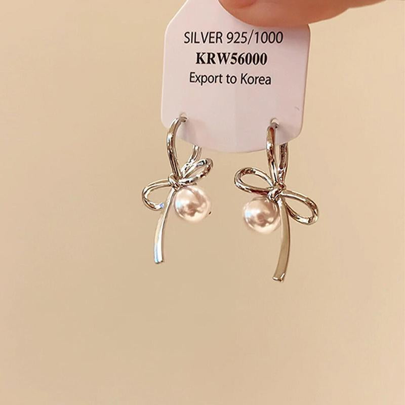 Elsa Bow Pearl Stud Earrings [0LMPWRFT]