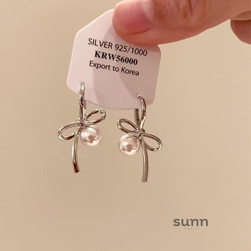 Elsa Bow Pearl Stud Earrings [0LMPWRFT]
