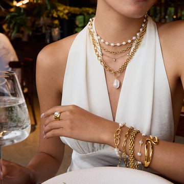 Genessis Pearl Cross Bracelet [EJAZ28SA]