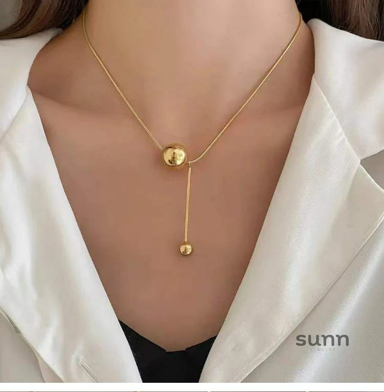Graceyn Delicate Ball Necklace