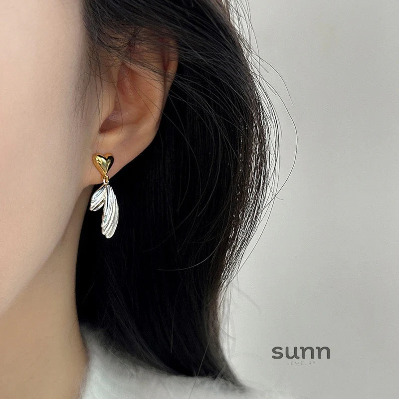 Graceyn Two-Tone Heart Tail Earrings