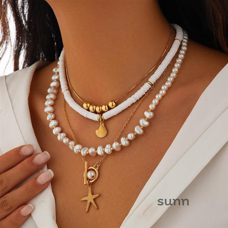 Hadley Layered Pearl Starfish Necklace [YJD3NUGE]