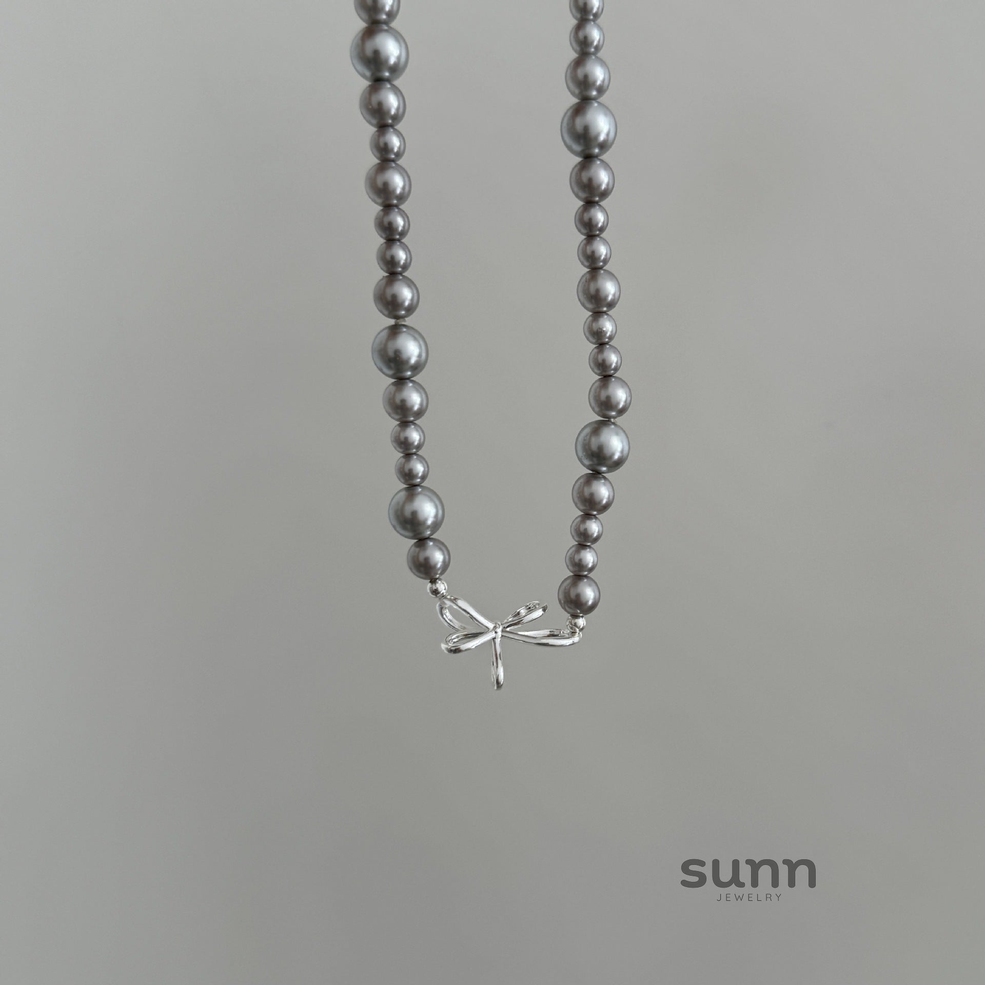Harlo Pearl Bow Necklace [0CVVKURZ]