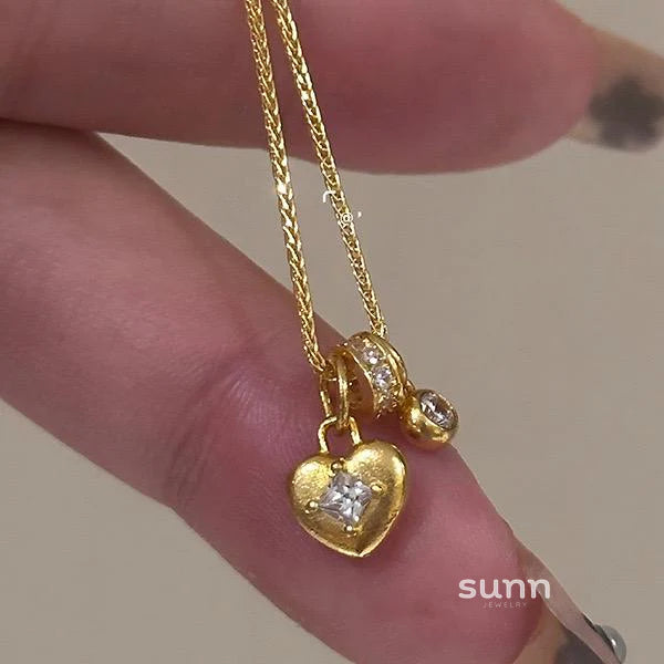 Jaliya Golden Starburst Heart Necklace
