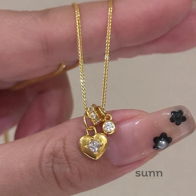 Jaliya Golden Starburst Heart Necklace