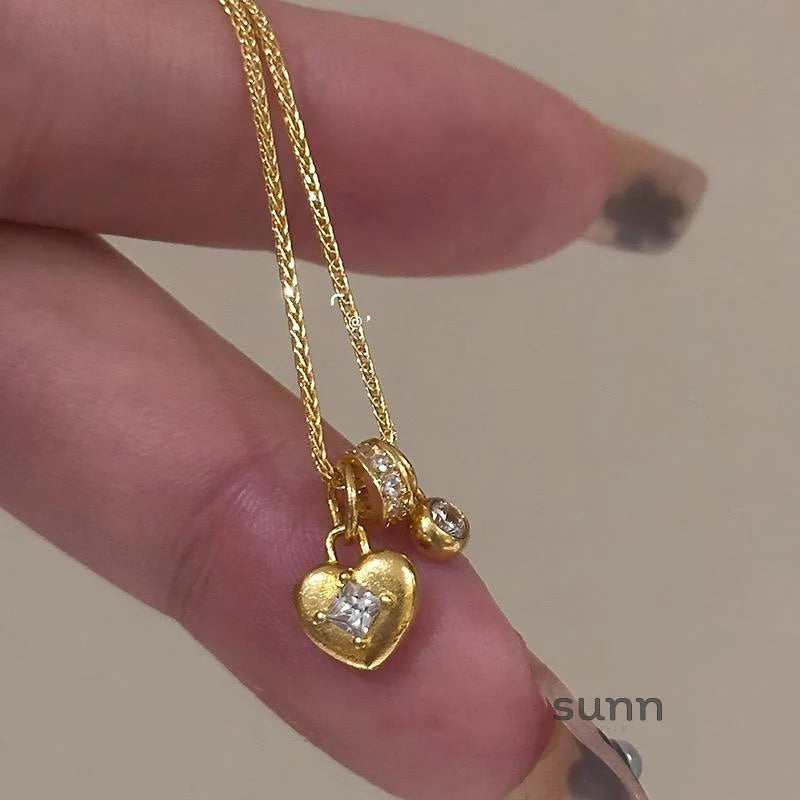 Jaliya Golden Starburst Heart Necklace