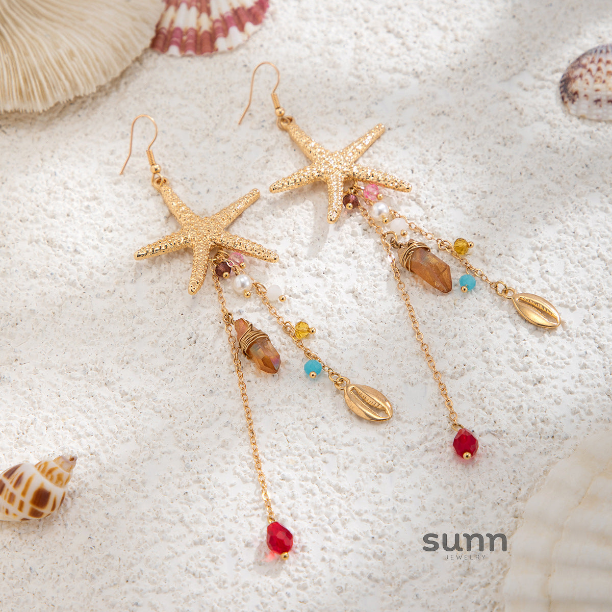 Jamilah Ocean Charm Tassel Earrings [PROPEWJN]