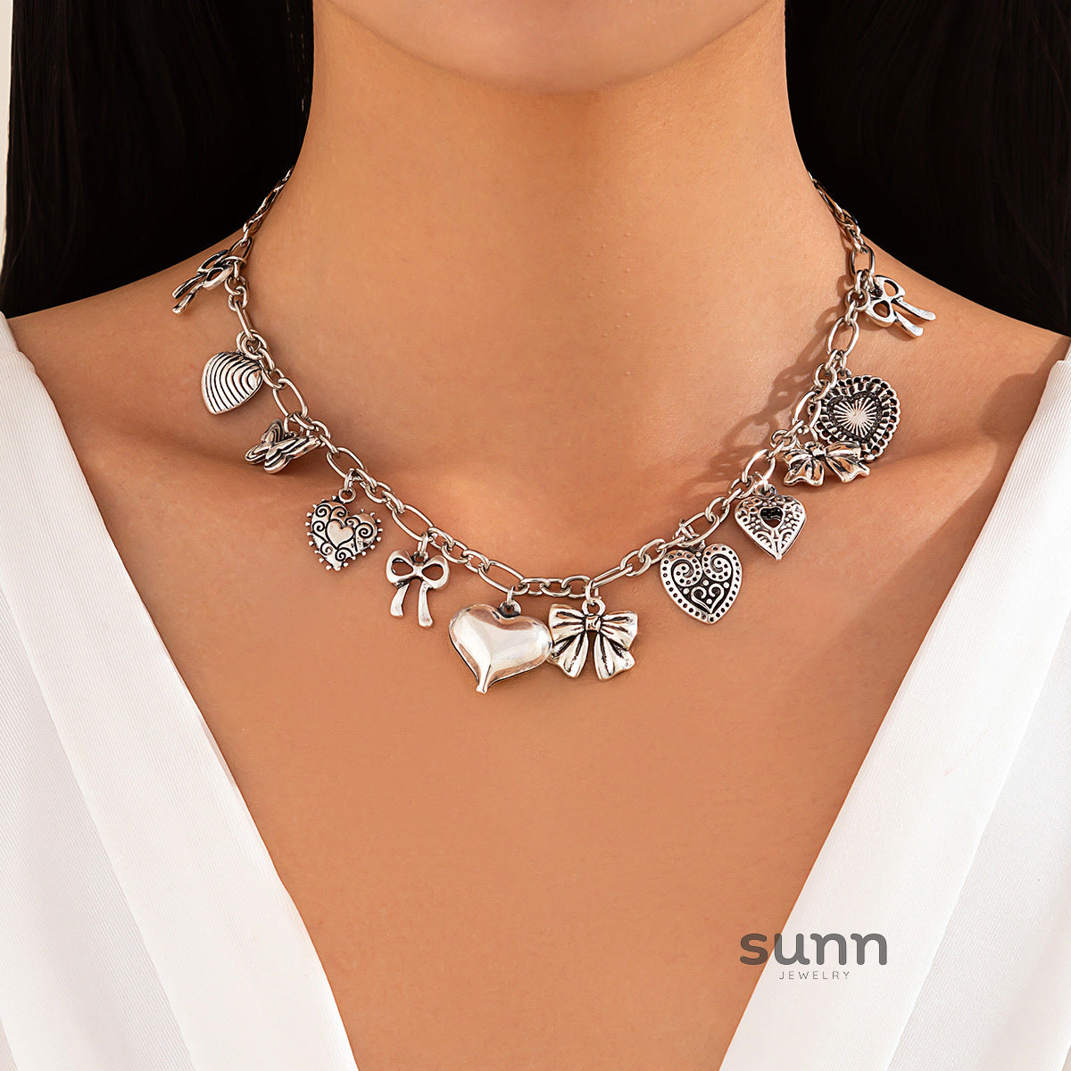Jayne Heart Bow Tassel Necklace [NVGDO3E1]