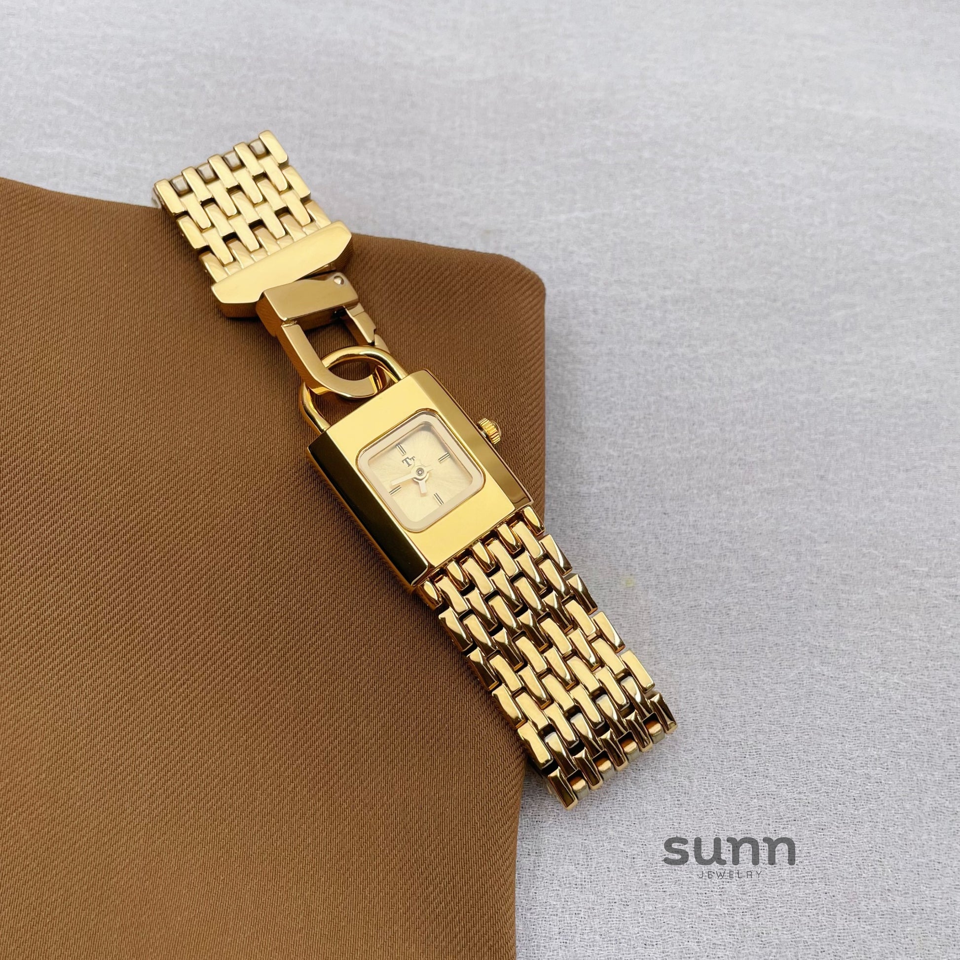 Joleen Lock Charm Bracelet Watch