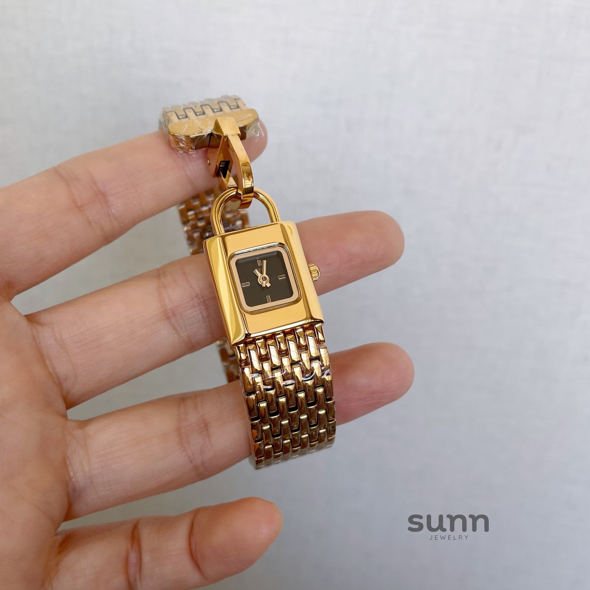 Joleen Lock Charm Bracelet Watch