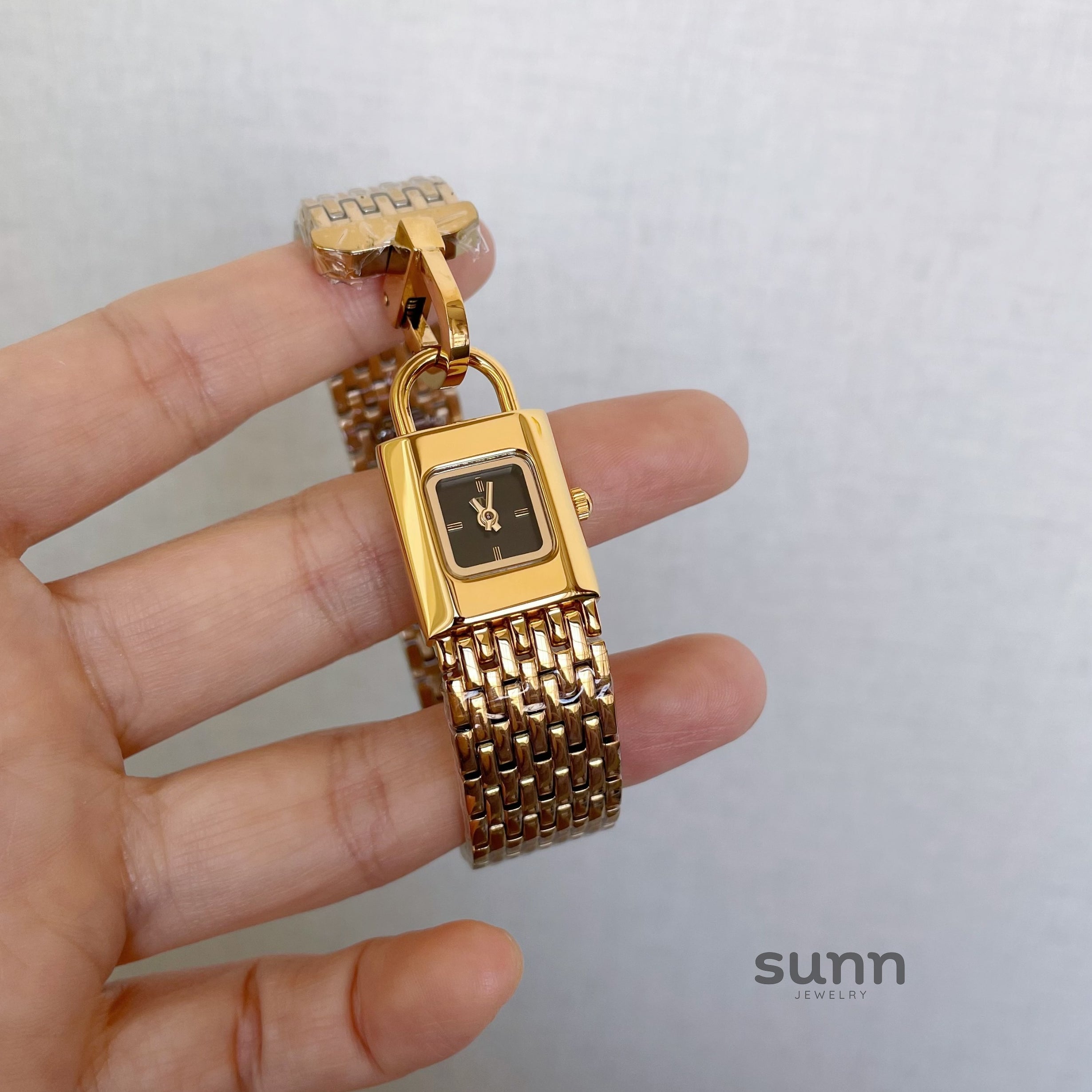 Joleen Lock Charm Bracelet Watch