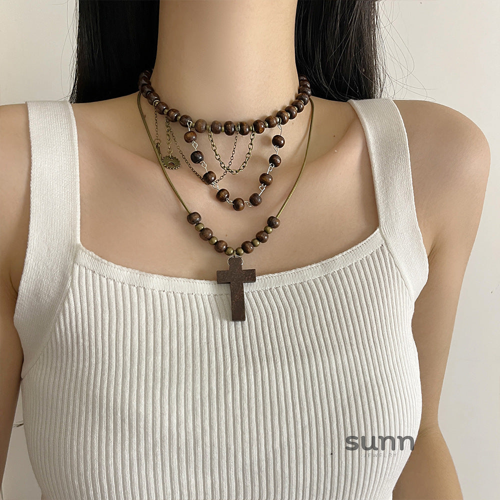 Karra Wood Bead Cross Necklace [0C8FIRE2]
