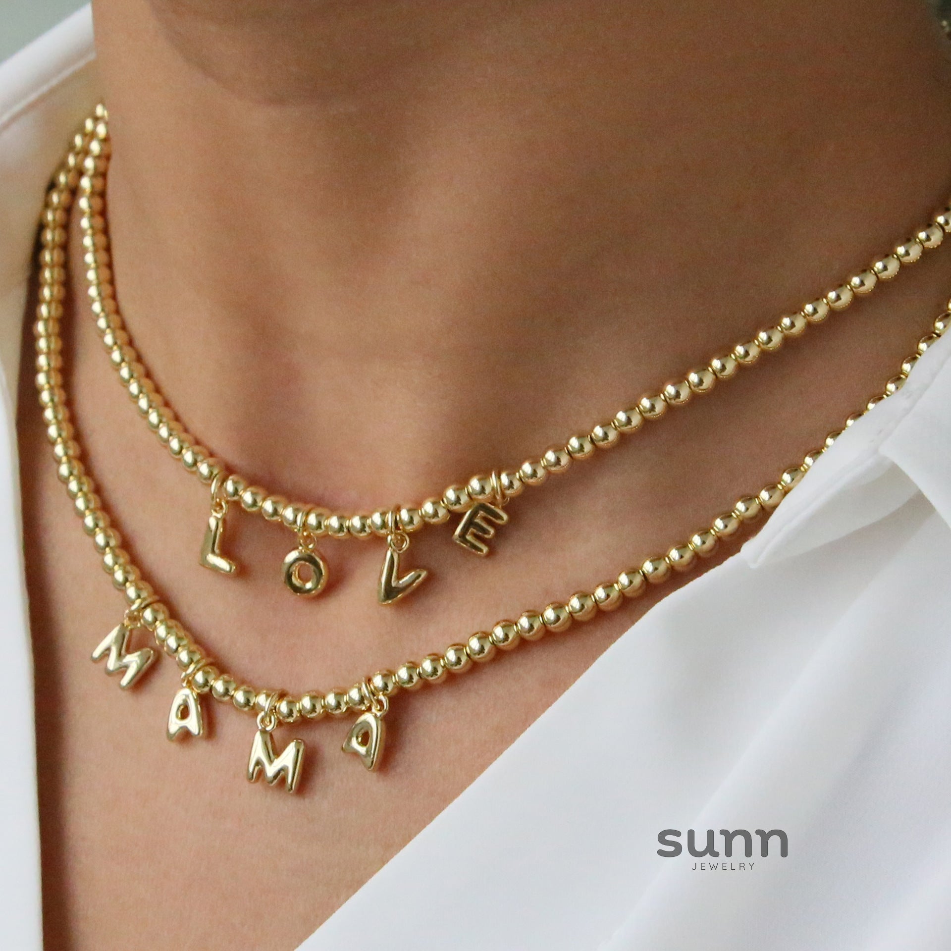 Kelani Beaded Letter Necklace [M0E2WPG9]