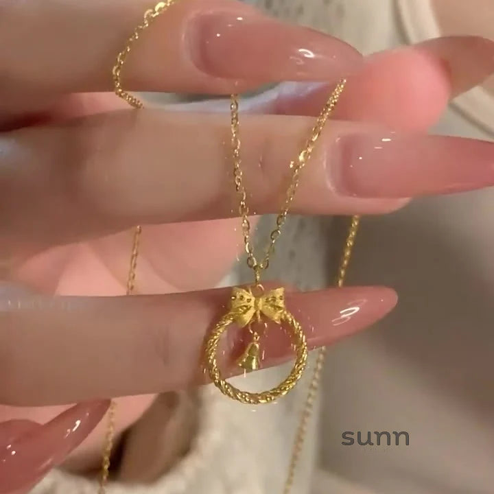Krisha Gold Bow Bell Necklace